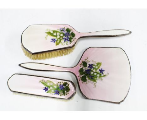 George VI silver and enamel dressing table brush set, with lily of the valley pattern, London 1947, comprising hairbrush, han