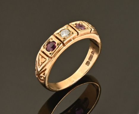 A ruby and diamond three stone ring, in 9 ct hallmarked gold setting.  Size K, 3 grams gross in James W Clement's Carlisle bo