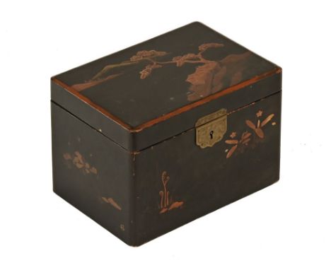 A Japanese lacquered tea caddy, decorated with Mount Fuji, two interior compartments.  Length 20 cm.