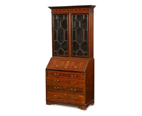 An Edwardian inlaid mahogany bureau bookcase, top half with moulded cornice above a pair of glazed doors with wooden astragal