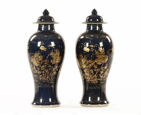 A pair of 19th century Chinese lidded vases, decorated with gilt chrysanthemum.  Height 34 cm. CONDITION REPORT: Both vases i