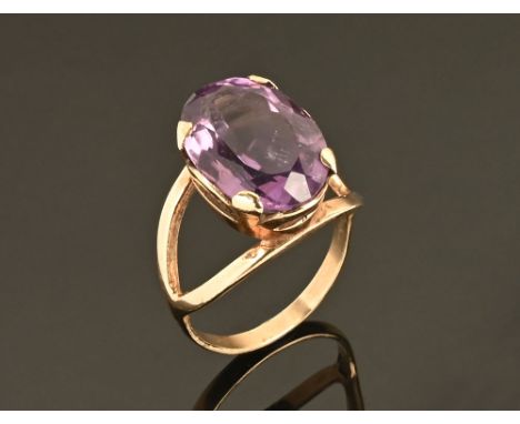 An amethyst stone ring in gold setting, stamped 8 ct.  Size L, 4 grams gross.