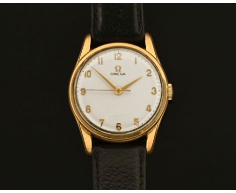 A vintage 9 ct gold cased Omega gentleman's wristwatch, with Arabic numerals and original Omega crown and buckle.  Omega box.