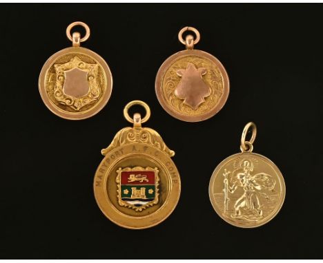 A Maryport Amateur Football Club 9 ct gold enamelled fob, a 9 ct gold St Christopher and two further watch chain fobs.  17.7 