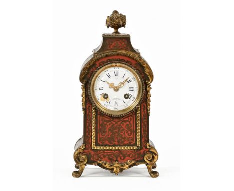 A 19th century Boulle marquetry mantle clock, with two train striking movement by Lay Paris.  Height 30 cm.
