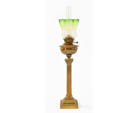 A Victorian brass Corinthian column oil lamp, with etched green and clear glass shade.  89 cm high including glass chimney. C