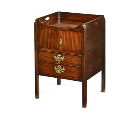A George III mahogany tray topped commode, with carrying handle to either side and with cupboard above the double drawer mode