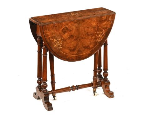 A Victorian inlaid walnut small Sutherland table, with moulded edge turned supports and original castors with gate legs.  Hei