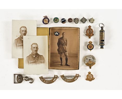 A Gold Flake cigarette tin, containing army and scout badges and an Acme boy scouts whistle.