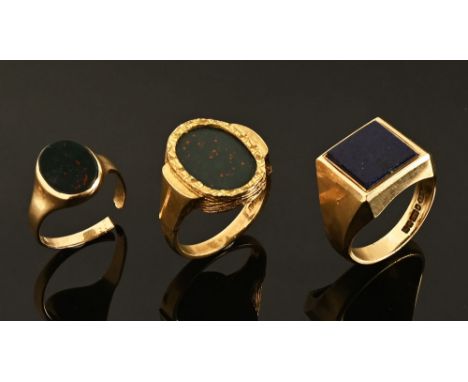 A 9 ct gold moss agate gentleman's ring, another similar with lapis lazuli and a third agate but cut.  Gross weight 21 grams.