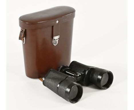 A pair of vintage Jenoptem 10 x 50 binoculars by Carl Zeiss, cased. CONDITION REPORT: The lenses appear to be clear of any fu