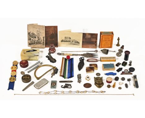 A quantity of miscellaneous collectibles, including plated bun fork, vesta case, small cylindrical leather box, paper clips e