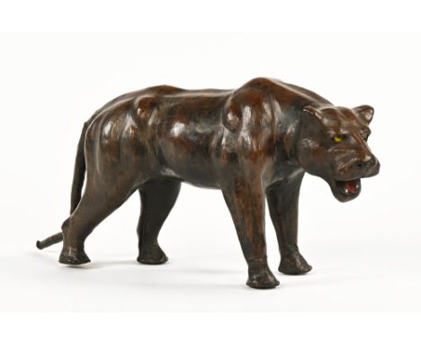 A vintage leather model of a panther.  Length 43 cm. CONDITION REPORT: It is difficult to age this piece but we would have th