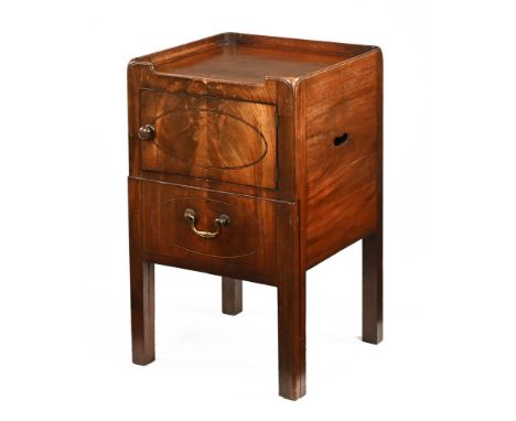 A Georgian mahogany commode bedside cabinet, with single cupboard and commode drawer with brass drop handle.  Height 75.5 cm,