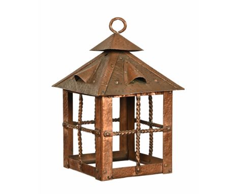 An early 20th century planished copper square form lantern light fitting.  Height 33 cm, top 22 cm square.