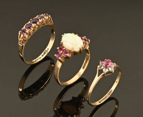 A 9 ct gold diamond cluster ring, with two further 9 ct gold rings, 6 grams gross (3).