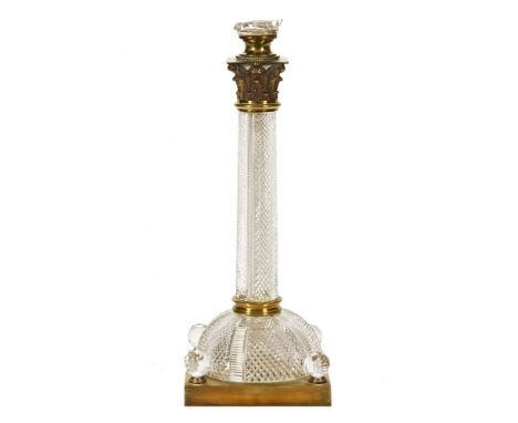 A 19th century cut glass oil lamp base, with brass Corinthian capital and square base.  Height 45 cm. CONDITION REPORT: There