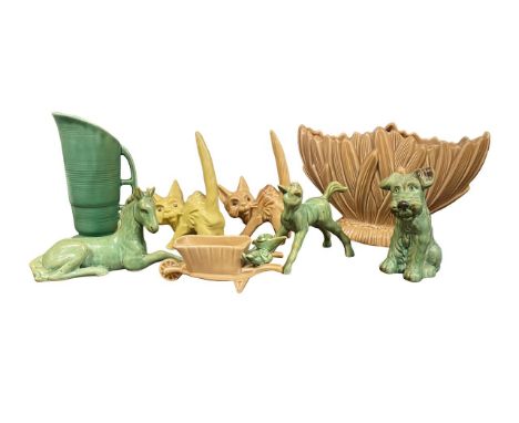 A selection of various Sylvac figurines, to include; Wheelbarrow (708), Horse (1334), Scaredy Cat x2 (1046), Seated Dog (1378