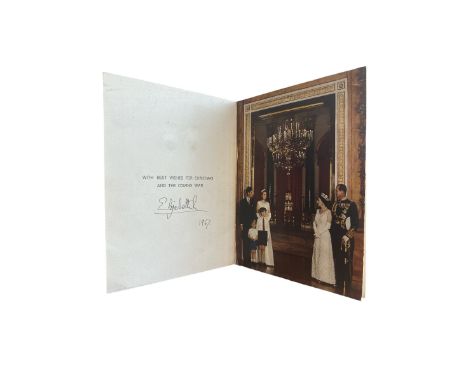 A 1967 Christmas Card sent by HM Queen Elizabeth II. Twin Royal cyphers on cover. Interior with photo of the Royal Family, in