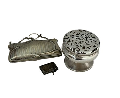 An Edwardian silver pot pourri holder, Birmingham 1909, minor dents, approx 200g. A small silver vesta case, approx 37mm in l