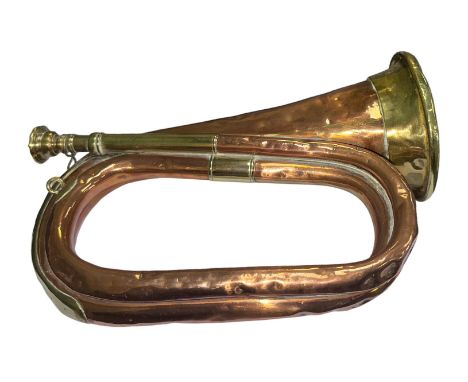 A Copper and Brass military Bugle by Mayers &amp; Harrison, Manchester. Numerous dents.