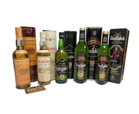 Five bottles of Malt Scotch Whisky in presentation tins/tubes to include Glenfiddich Special Reserve (1 litre), Glenfiddich (