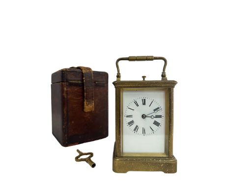 A French repeating carriage clock, circa 1890s. Housed in a brass case with a white enamel dial and Roman numeral 5 min marke