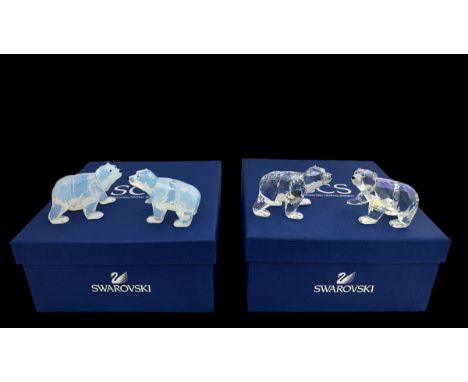 Two sets of Swarovski crystal Polar Bear Cubs - 'Siku White Opal' (9100 NR 000310) and 'Siku Crystal Moonlight,' (9100 NR 000