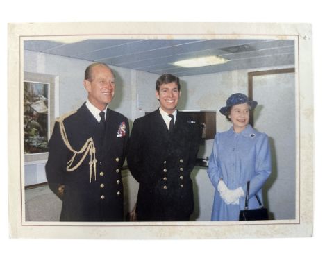 1982 Christmas Card from HM Queen Elizabeth II. Front cover showing Queen Elizabeth and Prince Philip with Prince Andrew at a