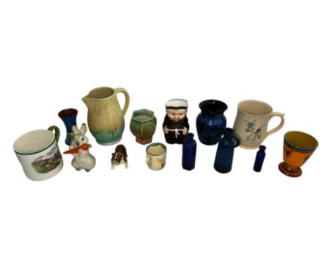 A selection of various interesting ceramic items to include; a Wade Harvest Ware “Cranky Tankard” with ‘The Floppity’ design 