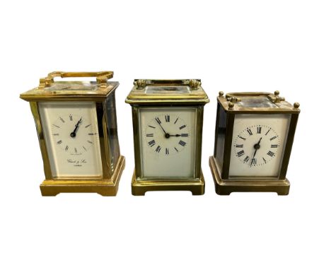 A Glock &amp; Son carriage clock with two French carriage clocks (one has key).