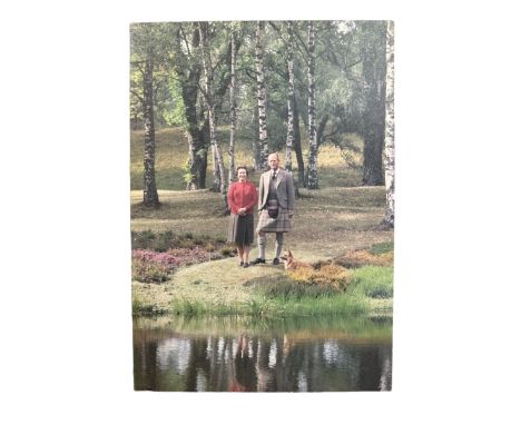 1984 Christmas card from HM Queen Elizabeth II. Cover with printed photo of The Queen and The Duke of Edinburgh standing by a