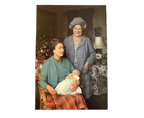A 1988 Christmas card from HM Queen Elizabeth II. Cover with printed colour photograph of The Queen holding a baby Princess B