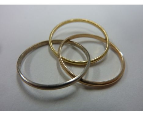 Cartier, an 18-carat (marked 750) three-colour gold Russian-style wedding ring; together with original Cartier box and foldin