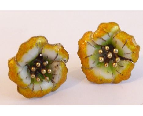 A pair of yellow metal and enamel&nbsp;stud earrings; modelled as flower heads in Danish style