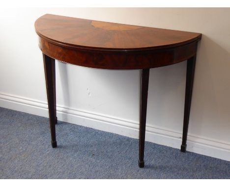 A good late 18th century George III period mahogany and rosewood cross-banded demi lune card table; a fold-over top with boxw