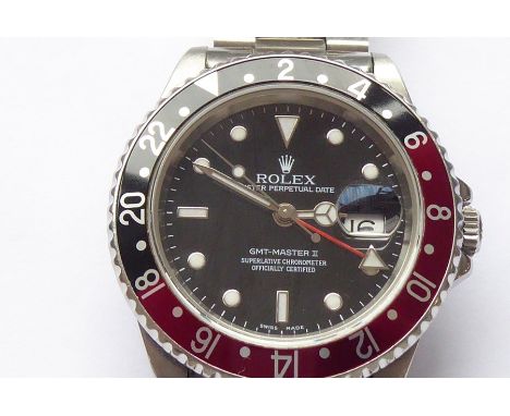 A gentleman's Rolex Oyster Perpetual GMT-Master II in steel with red and black (coke) bezel, circa 1998, model no.16710, seri