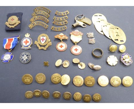 A selection of enamel Red Cross and other badges and awards, one engraved 'Zoe Beaver' (sister of Mary Duchess of Bedford), t