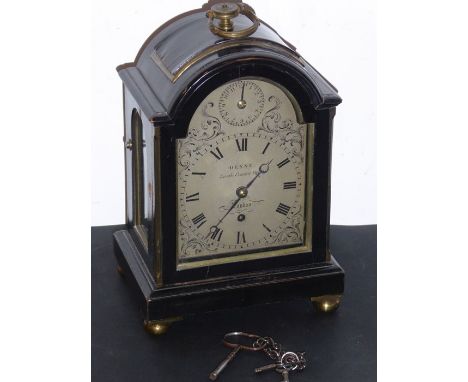 A fine early 19th century ebonised cased bracket clock (in 18th century style); the brass finial above 4" silvered dial signe