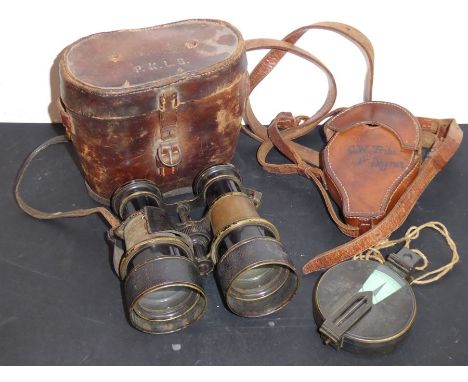 A pair of late 19th century leather-cased field glasses in used condition, together with a&nbsp;brass military compass in its