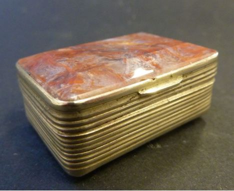 A late 19th/early 20th century base-metal snuff box with faceted rectangular dendritic agate base and cover, the metal mounts