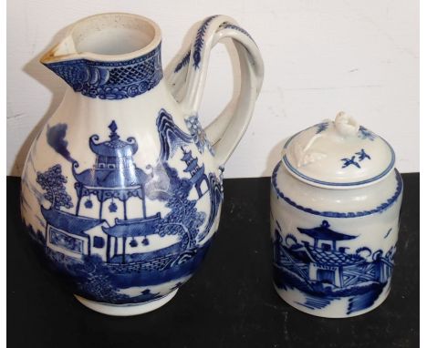 A late 18th century sparrow-beak porcelain jug of baluster form, transfer-decorated in the Willow Pattern with twisted applie