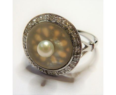 An 18-carat white-gold, pearl, mother of pearl and diamond ring; ring size&nbsp;&nbsp;(The cost of&nbsp;UK postage&nbsp;via R