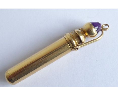 A late 19th/early 20th century gold (marks rubbed) fob pencil; the handle finial mounted with a cabochon amethyst (total appr