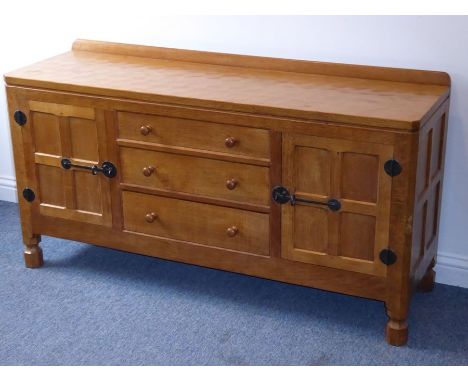 A good Robert 'Mouseman' Thompson of Kilburn oak sideboard; the galleried back adjoining to an adzed top and three central gr