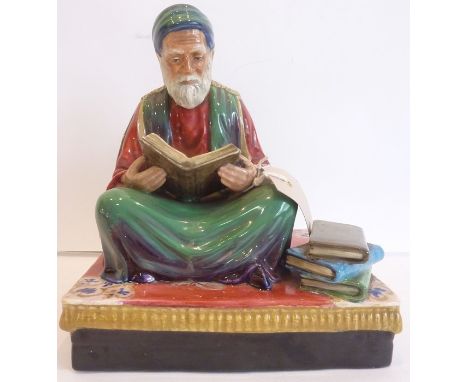 Reginald Johnson ('Reg' Johnson, born 1909), an early to mid-20th century ceramic figure, titled 'Tunisian Scholar at Law by 