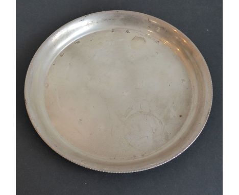 A hallmarked silver circular salver having raised gadrooned border, assayed Birmingham 1936 (24.5cm diameter, approx. 444g) T