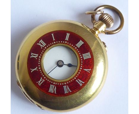 A lady's late 19th/early 20th century 18-carat gold-cased (marked 18K) half hunter pocket watch; the outer case with red-enam