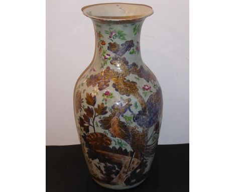 A 19th century Chinese celadon glazed porcelain vase of baluster form; the front gilded and decorated with a large exotic bir