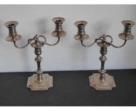 A pair of late 19th/early 20th century two-light silver-plated candelabra by Elkington &amp; Co (fully marked) (29cm high)